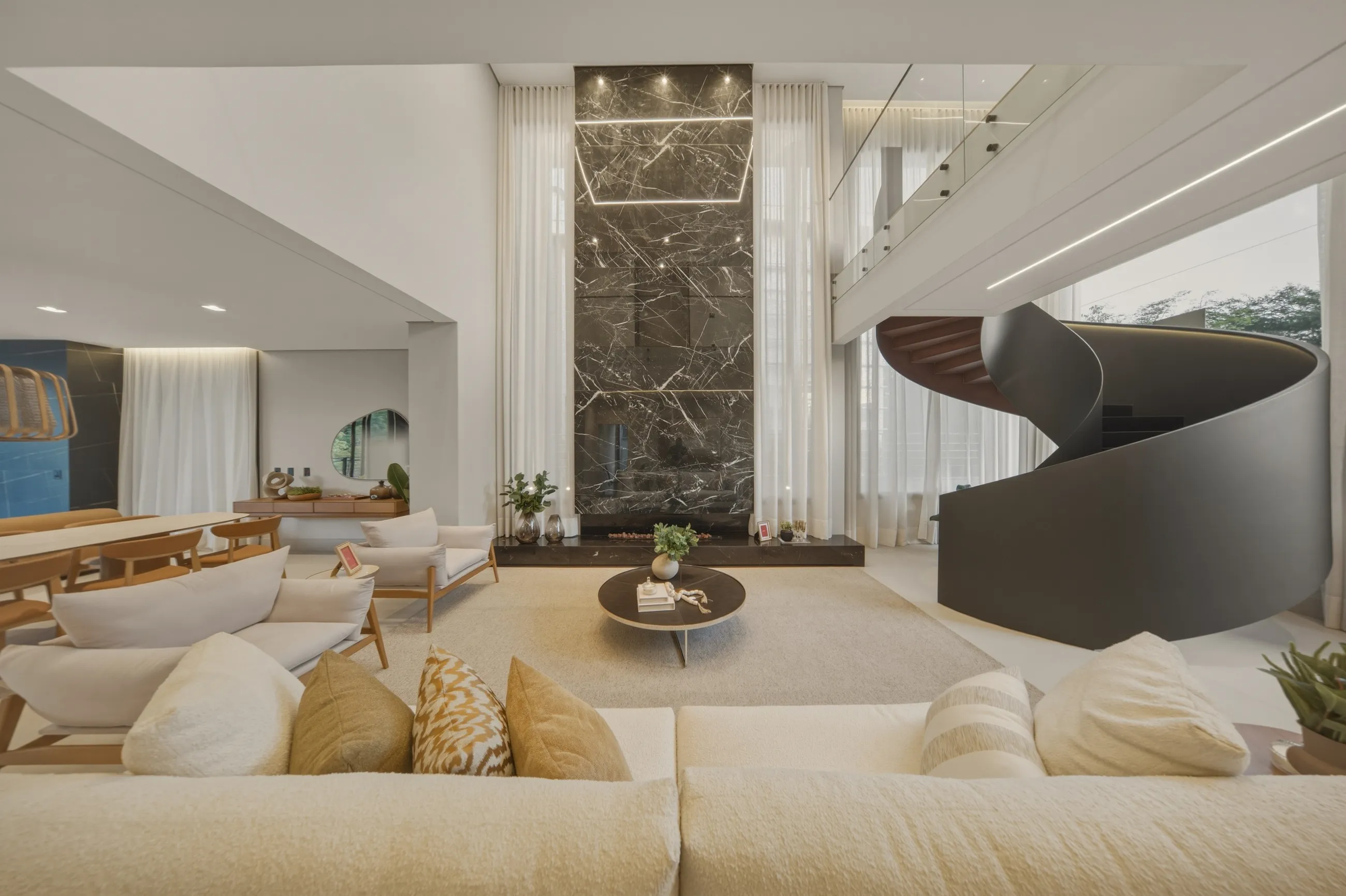 Casa Contemporânea no Tamboré 11 com Escada Escultural e Acabamentos Premium