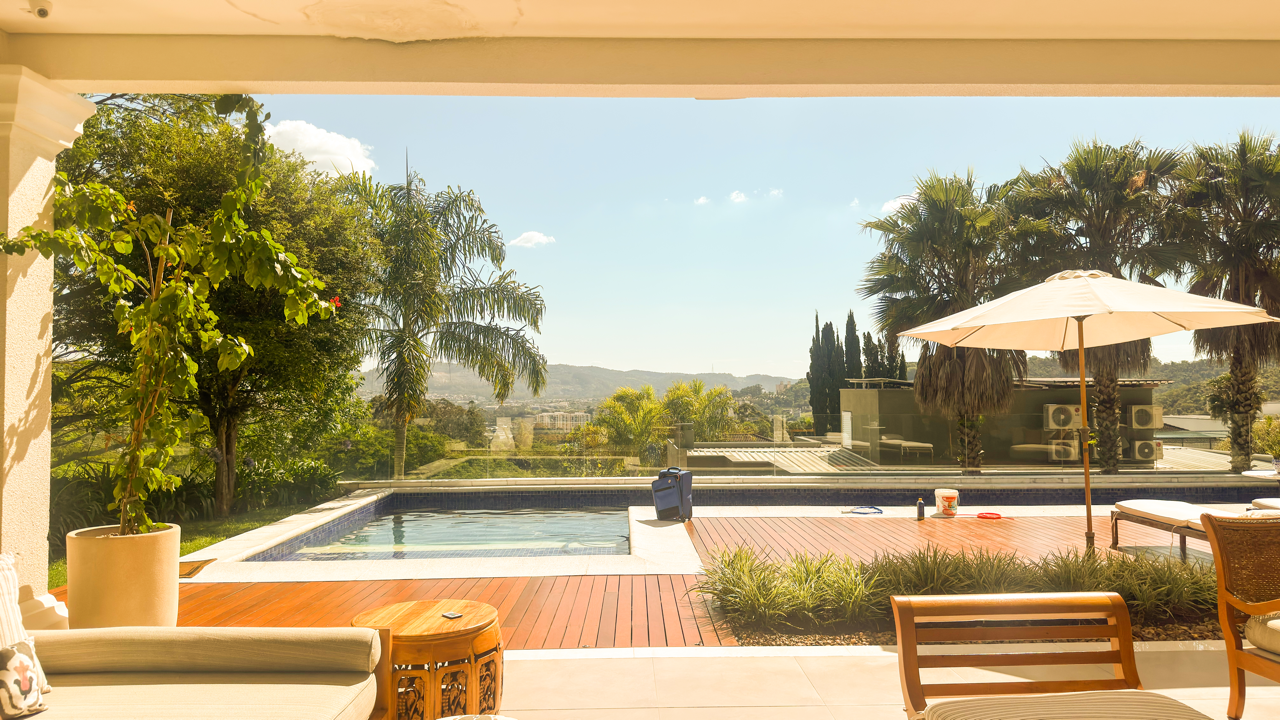CASA EM DOIS TERRENOS DE ESQUINA COM VISTA NO TAMBORÉ 10